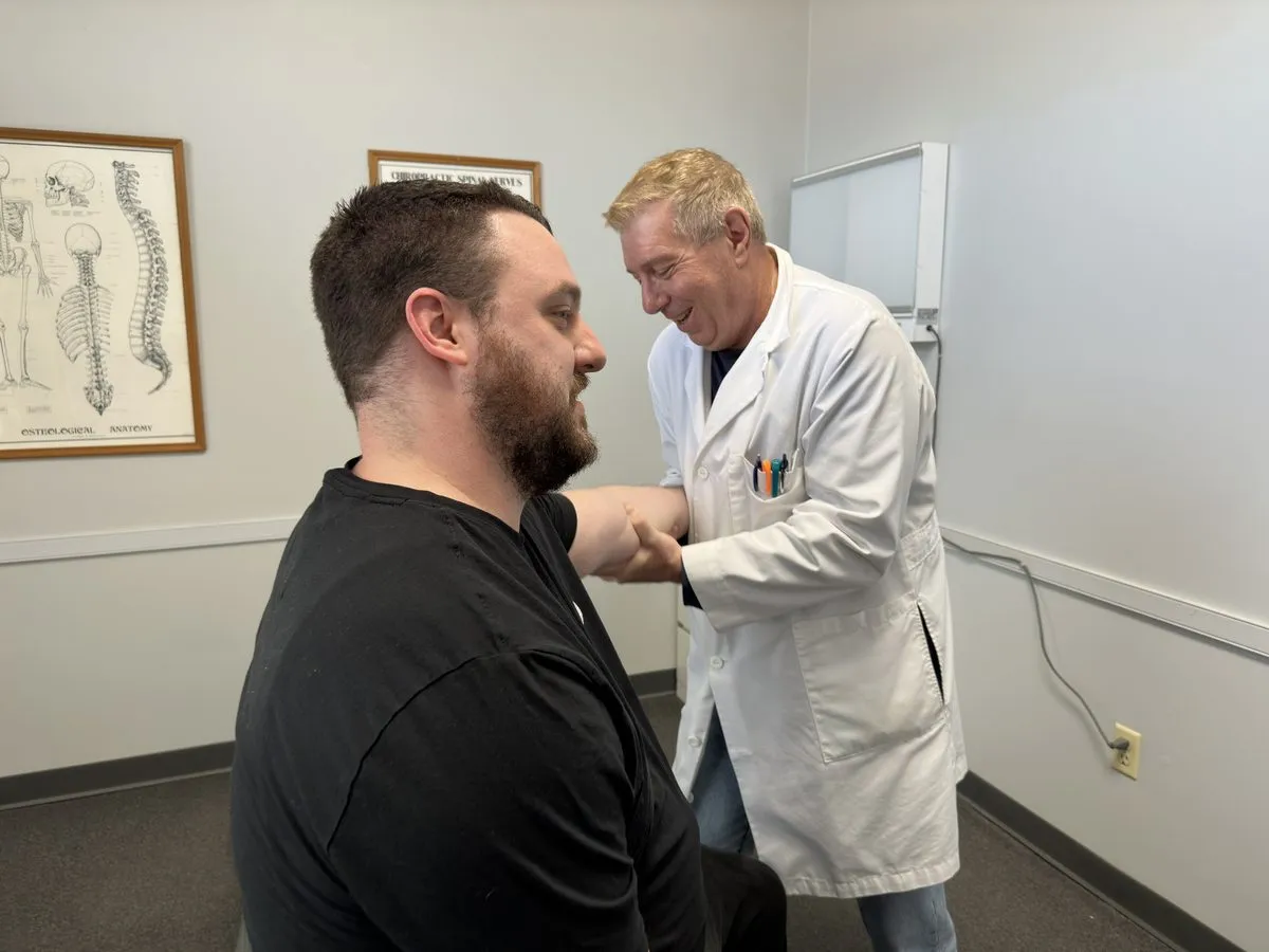 Chiropractor treating a patient at Crest Hill Clinic