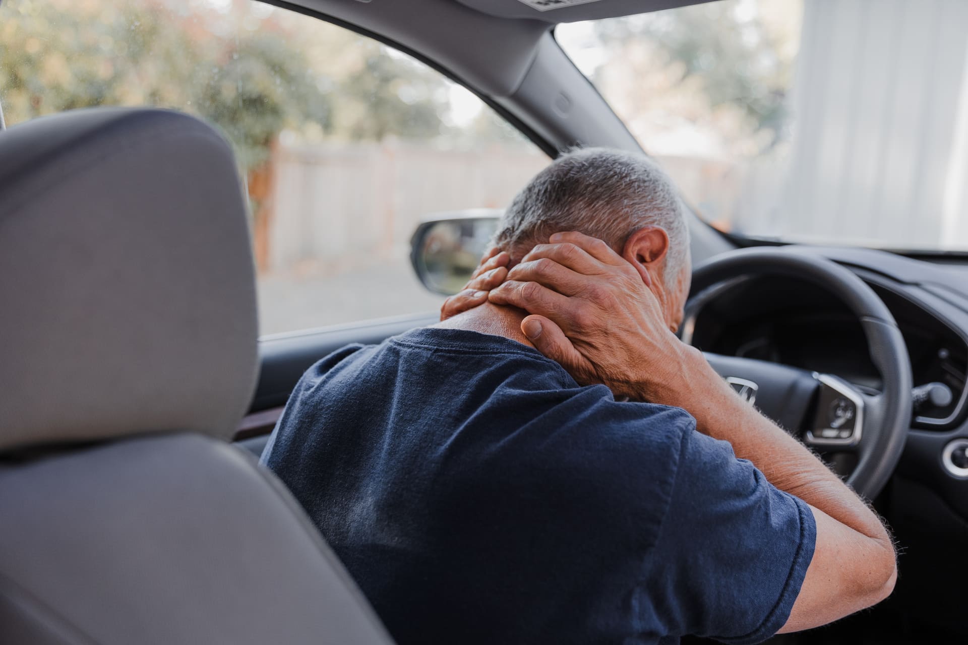 Patient experiencing neck pain after an auto accident