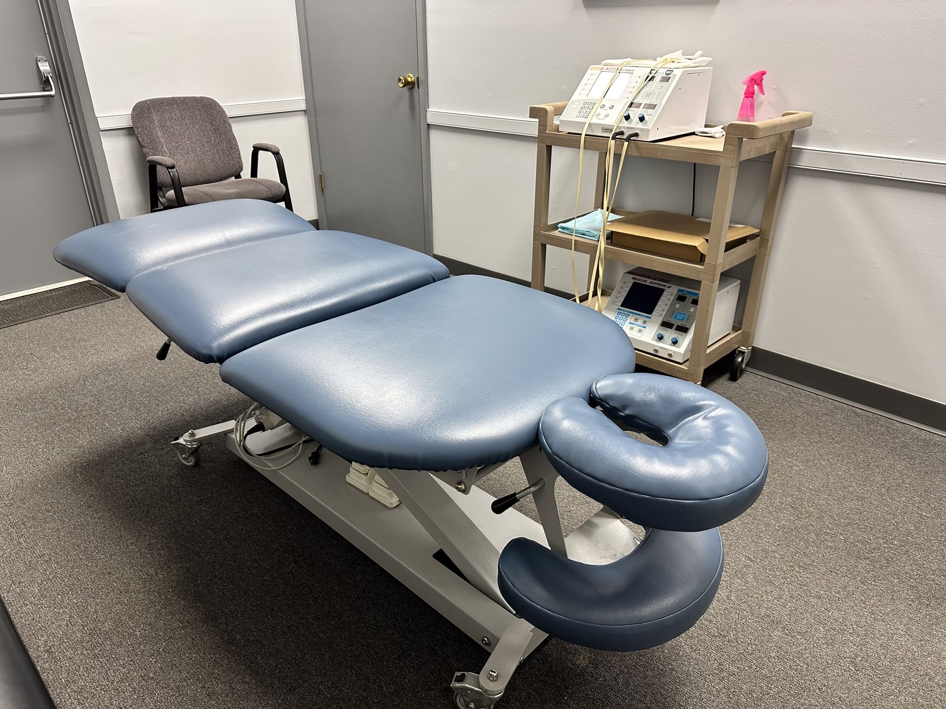 Patient receiving care on the examination table at Crest Hill Clinic near Joliet